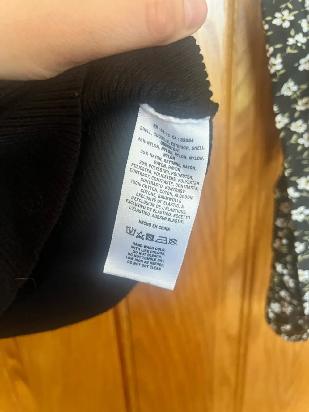Anthropologie - Woven Ruffle Black Ribbed Bodice Top with Floral Puff Sleeves